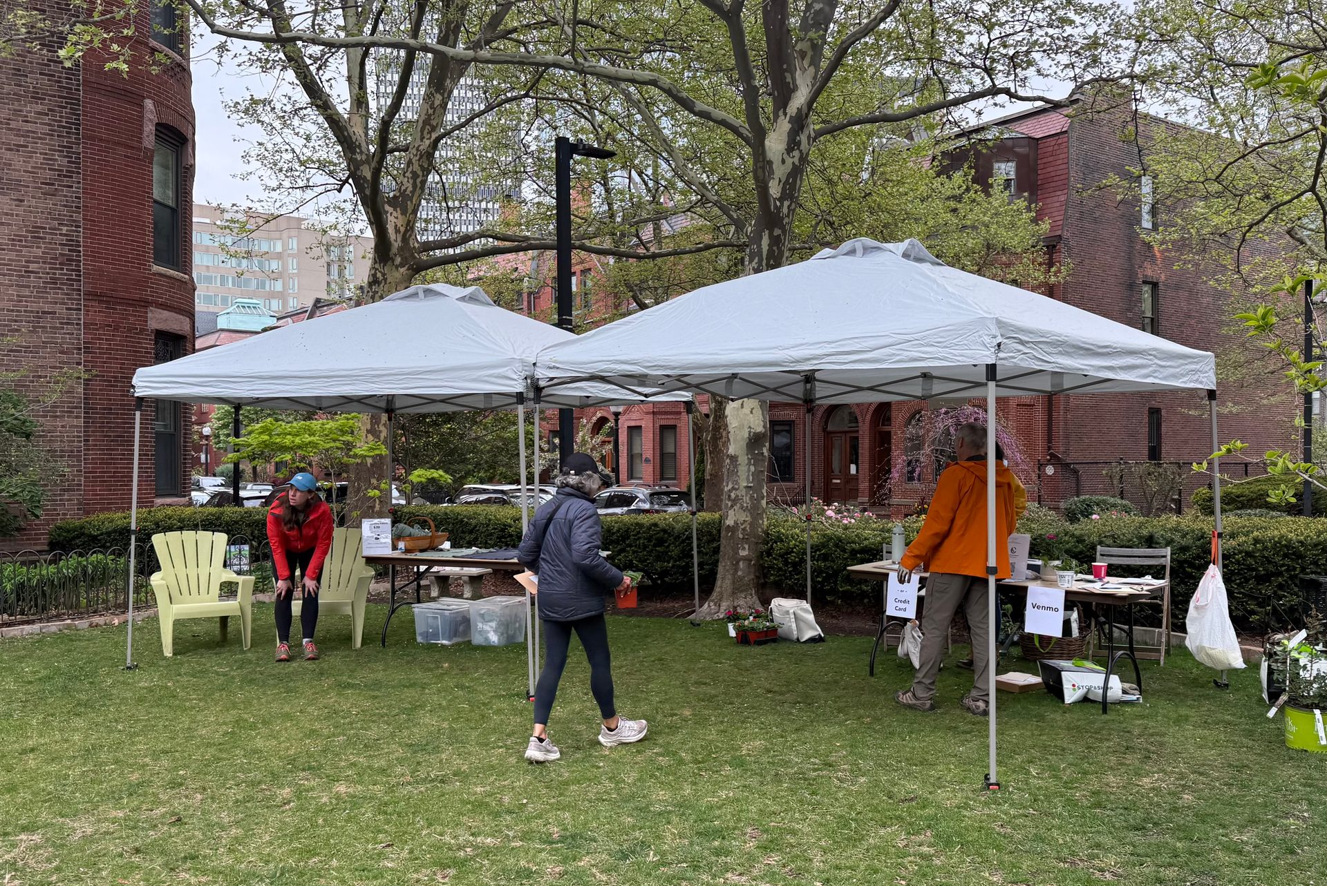 Canopy tents set up on Durham Grass with the South End in the background